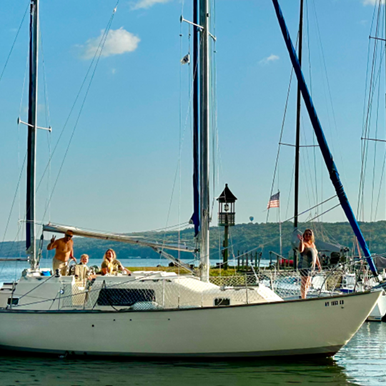 The Lansing Harbor team appraising a boat